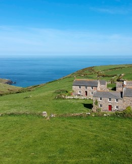 Granite cottages on a Cornish clifftop