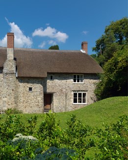 A stone thatched cottage