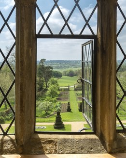 A view across gardens from an elevated window
