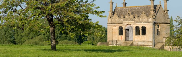 A decorative folly standing in fields