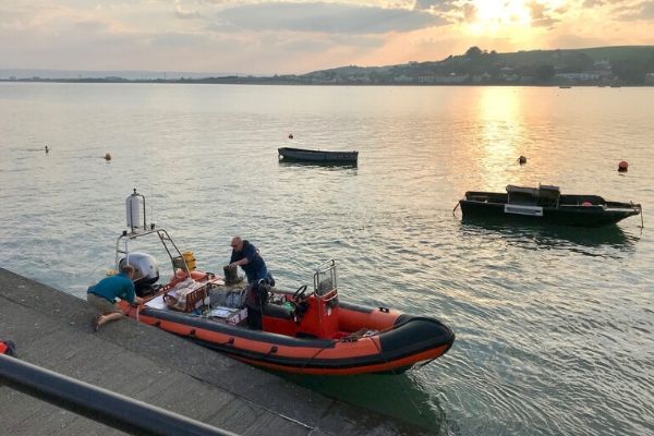 Loading the supplies from the dingy onto Lundy