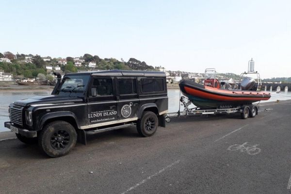 Land Rover and dingy ready for a trip to Lundy