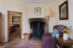 Beamsley Hospital int sitting with fireplace 1200x800