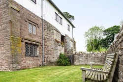 Bromfield Priory Gatehouse ext bench1200x800