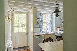 Coed y Bleiddiau int kitchen with door 1200x800
