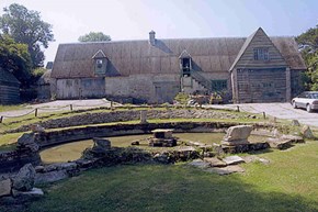 dunshay-history-external-stables-barn-pond-600x400