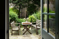 Elton House ext garden through door 1200x800