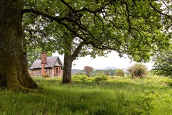 Glenmalloch Lodge ext through trees 1200x800