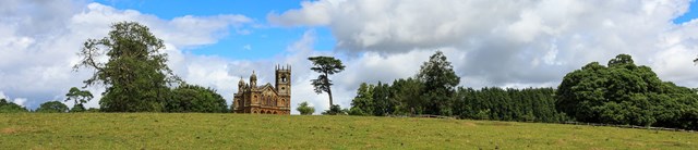 GothicTemple-exterior-cloudylandscape-1600x345