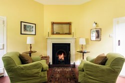 Houghton West Lodge living room fireside 1200x800