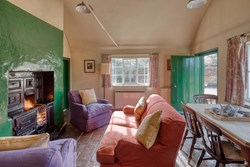 Lengthsmans-cottage-interior-sittingroom3-600x400