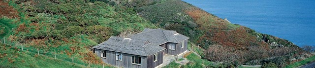 Cottages in a valley with views to the sea