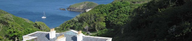 Lundy-Millcombe-exterior-backwithview-1600x345