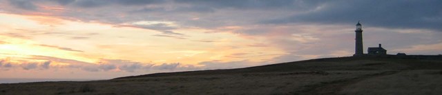 Lundy-oldlight-exterior-sunset-1600x345