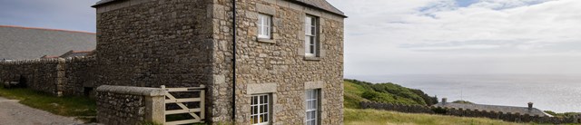 Square-Cottage-exterior-main-1600x345