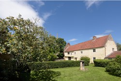 Methwold Old Vicarage ext with church 1200x800