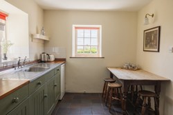 Paxton's Tower Lodge int kitchen with table 1200x800