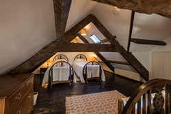 Paxtonstowerlodge-interior-triplebedroom2-600x400