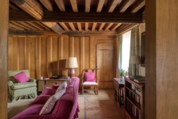 priests house living room through door 1200x800