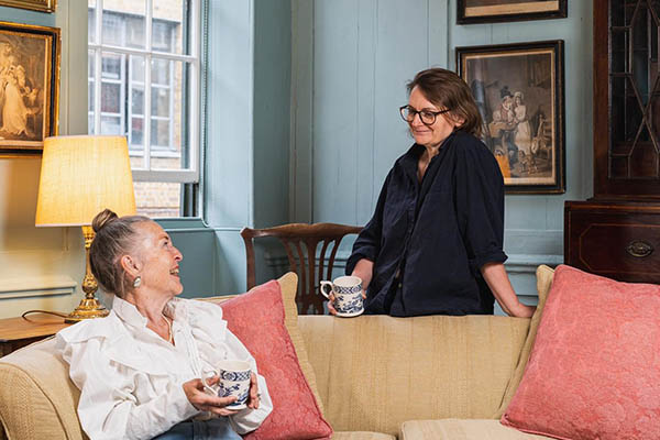 Housekeepers Pat loyd and Haidee Butler-Rubbino reminiscing on their time looking after Princelet Street in the sitting room