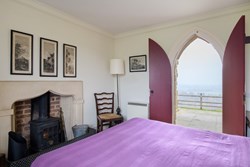 ruin bedroom with fireplace 1200x800