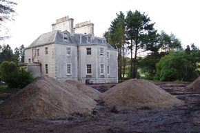 Saddellhouse-restoration-withpilesofdirt-600x400