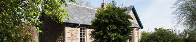 SaddellLodge-exterior-main-1600x345