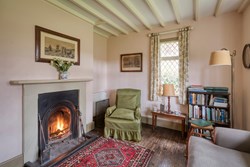 Keeper's Cottage sitting fire 1200x800