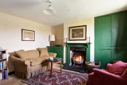 StokersCottage-internal-sittingroomfire-600x400
