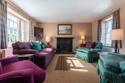 tower hill sitting with fireplace 1200x800