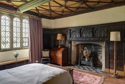 Wortham Manor downstairs double fireplace 1200x800