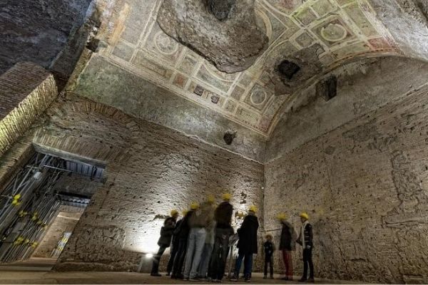 A wide show of the palatial chamber of Emperor Nero, with a beautiful tiled ceiling.