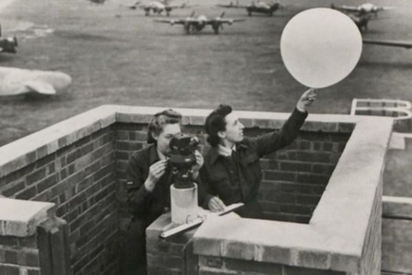 A black and white image of female meteorologists in the 1940s