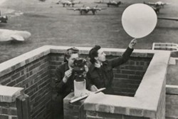 A black and white image of female meteorologists in the 1940s