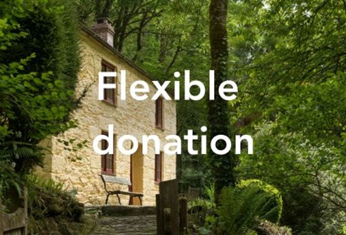 An image of a cottage with the words 'Flexible Donation' overlaid 